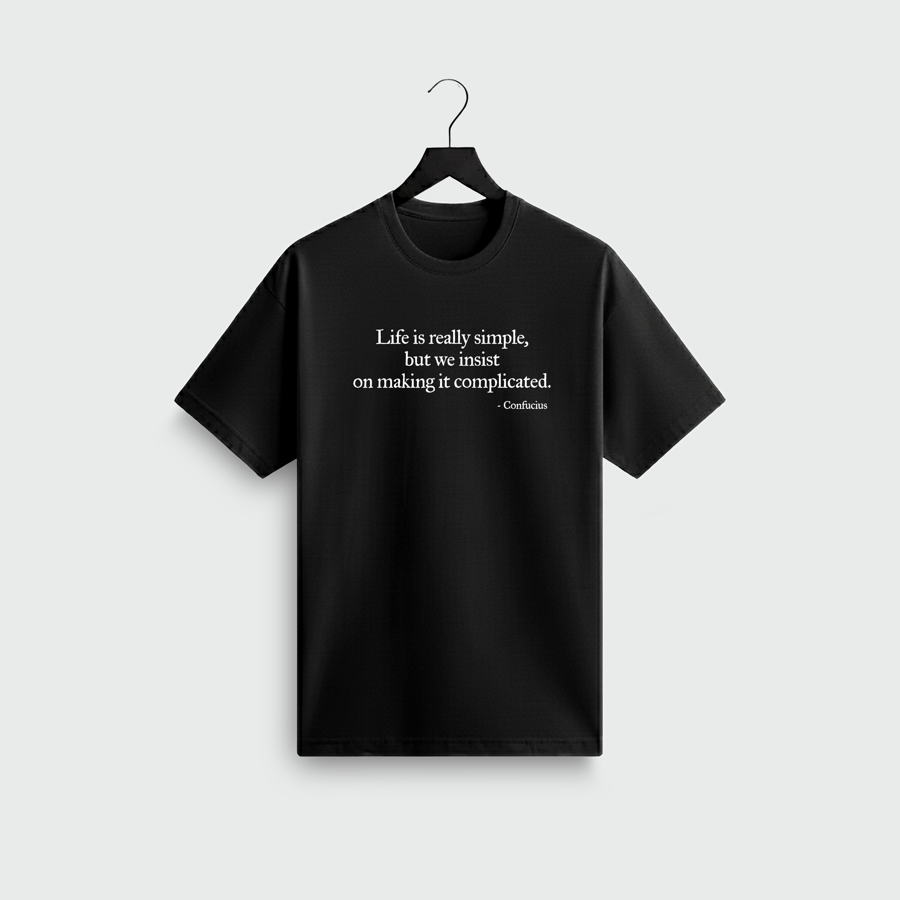 Black Minimalist Confucius quote t-shirt — “Life is really simple but we insist on making it complicated” — Notable Lines
