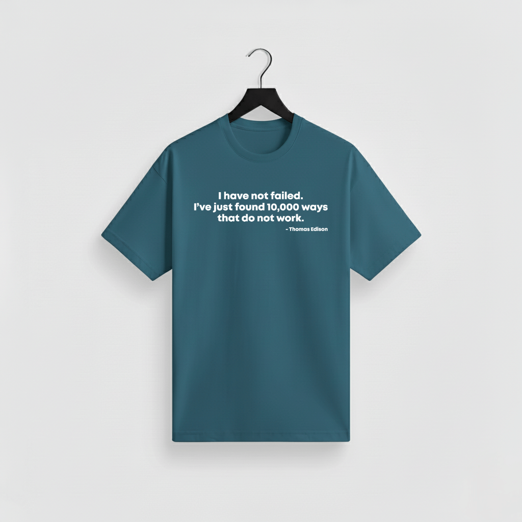 "I have not failed. I've just found 10,000 ways that do not work." — Thomas Edison A resilient, determined quote tee that celebrates persistence and creative problem-solving. Perfect for builders, learners, and anyone who knows progress comes from trying